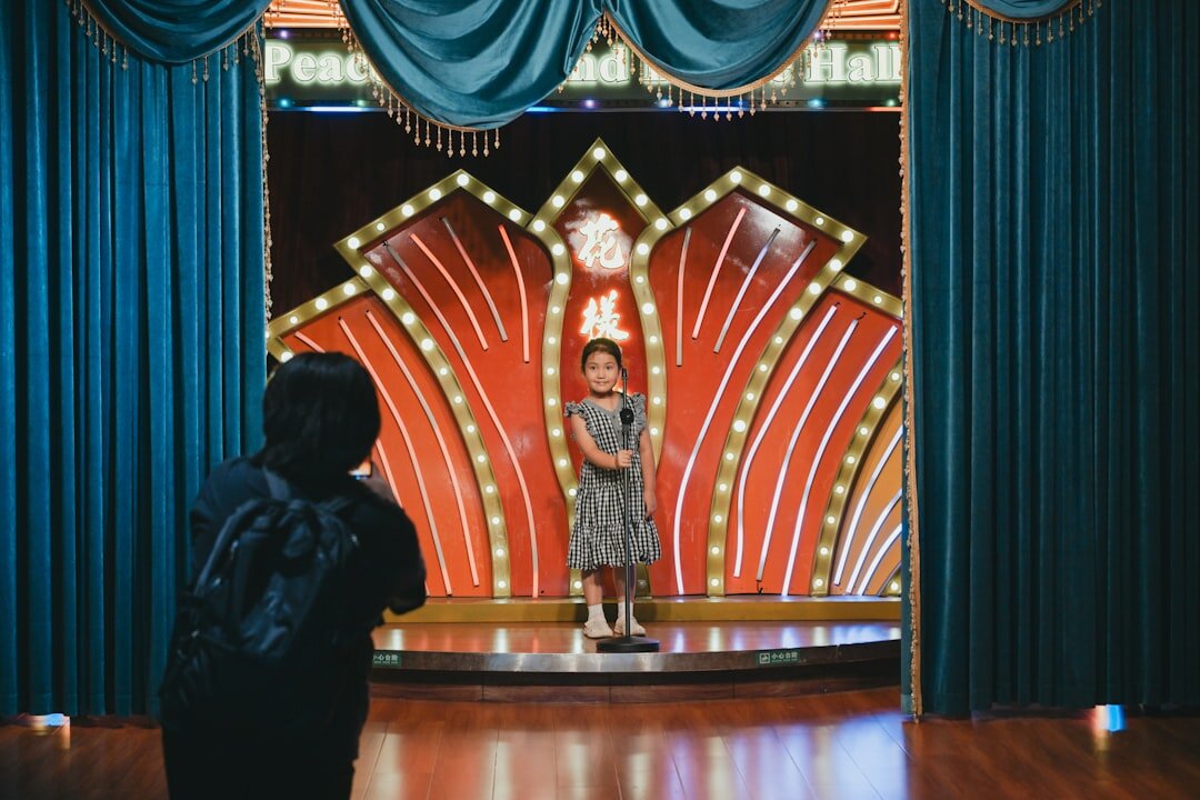 actress receiving award on stage